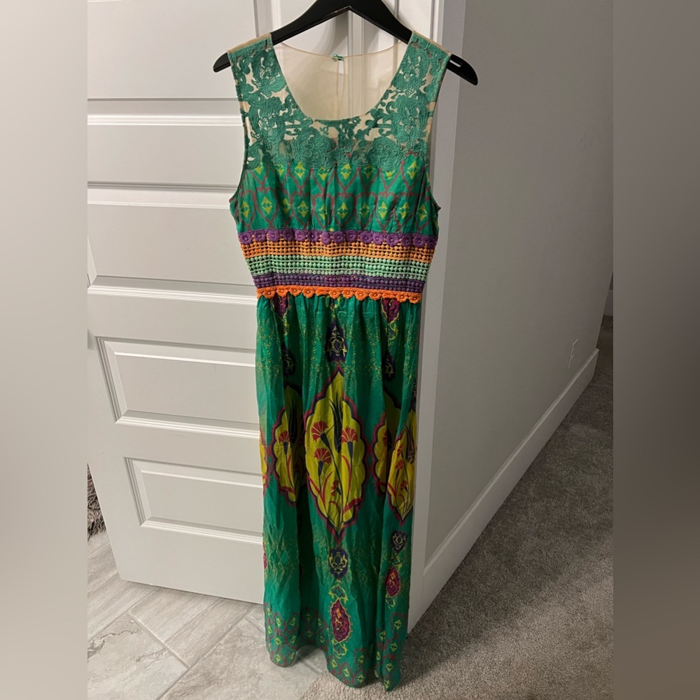 Lovely anthro maxi sunshine with sheer neckline.  Size 10, worn once!